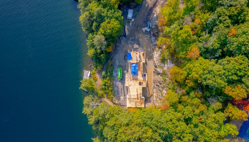 A Fuller waterfront build on the shoreline in Muskoka